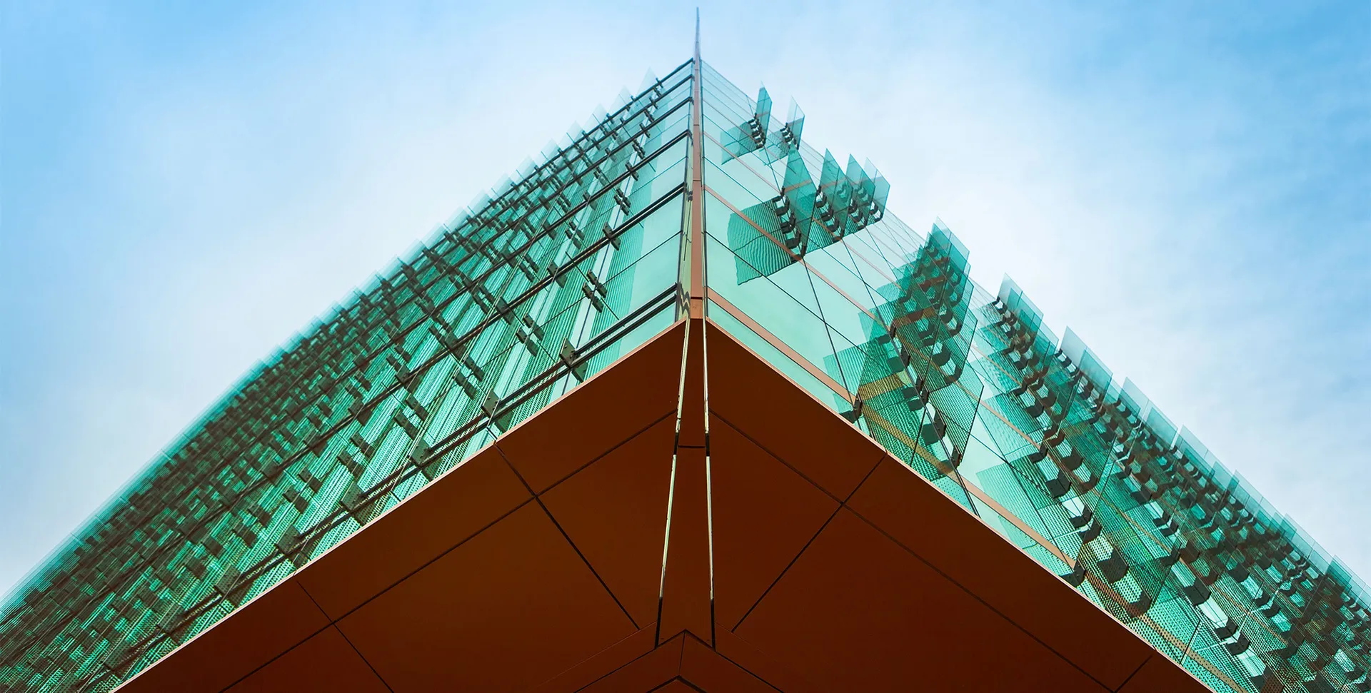 Modern building from the bottom. Corner of building shown