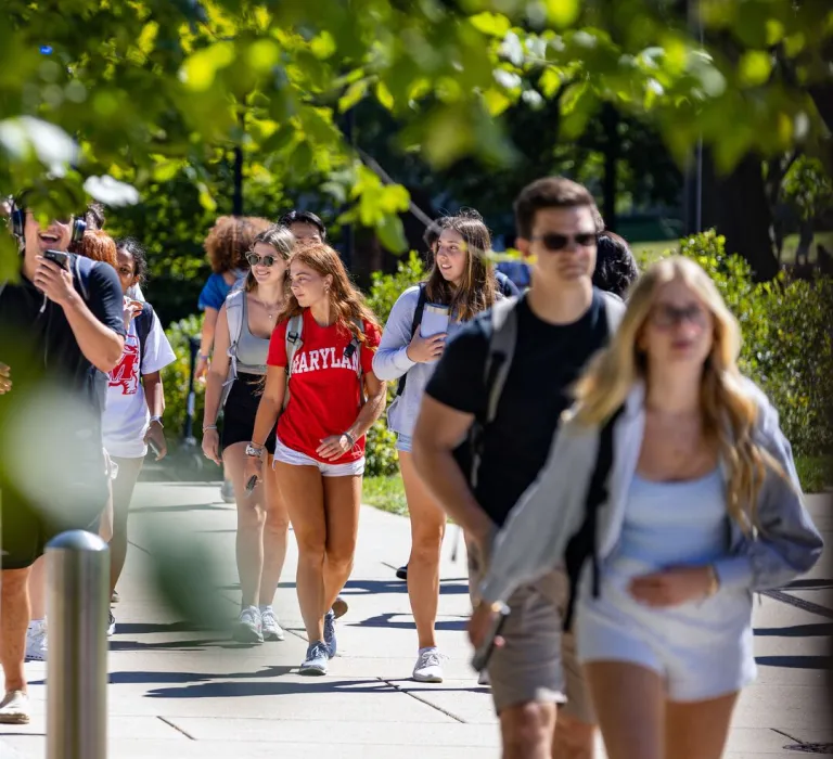 Lots of students walking on campus